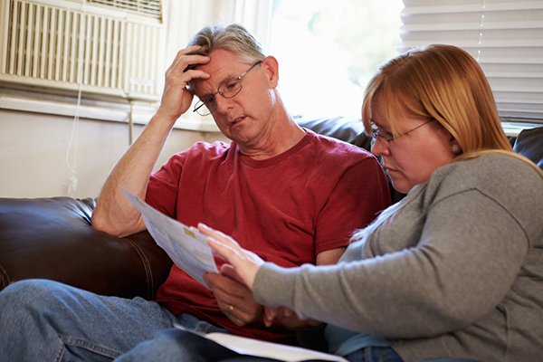 Couple reviewing bills